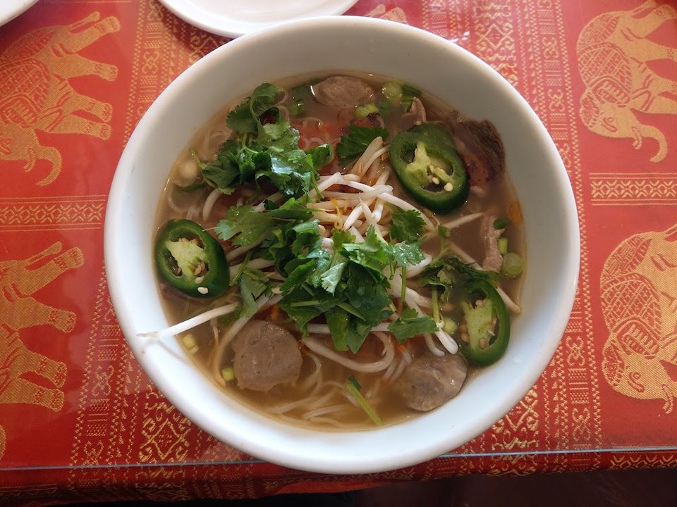 Menu page with Cambodian specialties and soups.